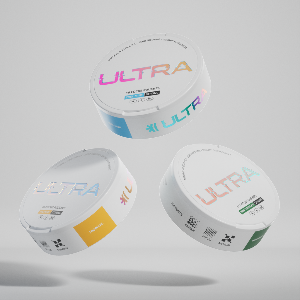 Angled view of three Ultra focus pouch tins showcasing flavor labels Tropical, Cool Mint and Wintergreen floating on a light gray background